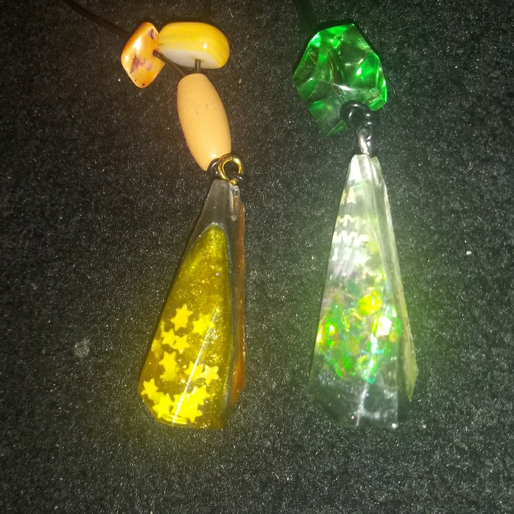 Slytherin and hufflepuff necklaces